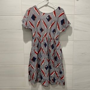 Farrow lace-up back dress in size M.